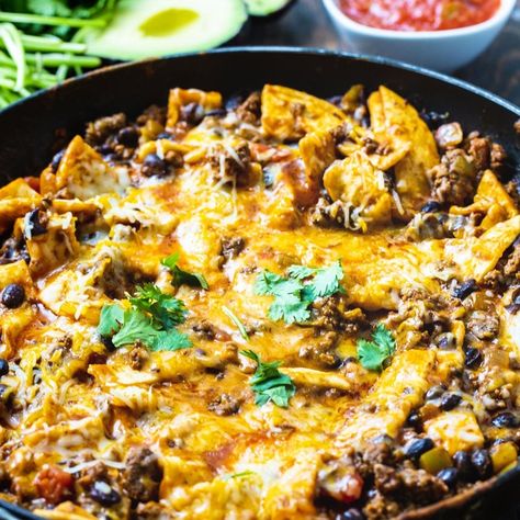 Easy Beef Burrito Skillet is full of ground beef, lots of cheese, black beans, salsa and tortilla chips. Much easier than making burritos! Easy Beef Burrito Skillet, Beef Burrito Skillet, Ground Beef Burritos, Burrito Skillet, Beef Burrito Recipe, Beef Burrito, Spicy Southern Kitchen, Southern Kitchen, One Skillet