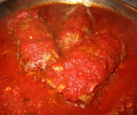 This recipe is my updated version of Grandma Angelo’s beef dish that was always served for special Italian gatherings. I use flank steak, butterflied, sprinkled with pecorino, garlic, Italian parsley, basil and prosciutto; then roll it together and braise in an Italian tomato sauce. I prefer keeping the  braciole in one large roll, and then to serve it sliced and arranged on a sauced platter.  My Grandma used a beef steak, usually bottom round, and cut it in strips to make individual size ... Rolled Flank Steak, Beef Braciole, Braciole Recipe, Flank Steak Recipe, Beef Flank, Italian Tomato Sauce, Flank Steak Recipes, Beef Roll, Homemade Dinner Rolls