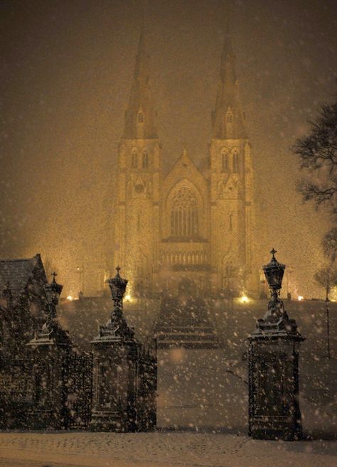 A snowy night at St Patrick's Cathedral, Armagh, North Ireland. Photo by Ryan Kelly Christmas In Ireland, Ireland Aesthetic, Armagh, Dark Landscape, Lace Curtain, Gothic Cathedral, Night Vibes, Environmental Art, Places Around The World