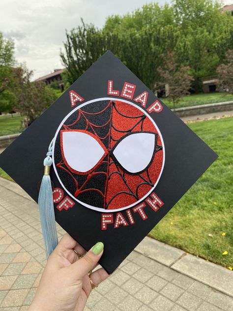 Grad cap inspired by Spiderman into the spiderverse! Spiderman Grad Caps, Spiderverse Graduation Cap, Spider Man Grad Cap, Graduation Cap Marvel, Fun Grad Cap Ideas, Cap Decoration Graduation Spiderman, Deadpool Graduation Cap, Miles Morales Grad Cap, Spider Man Cap Graduation