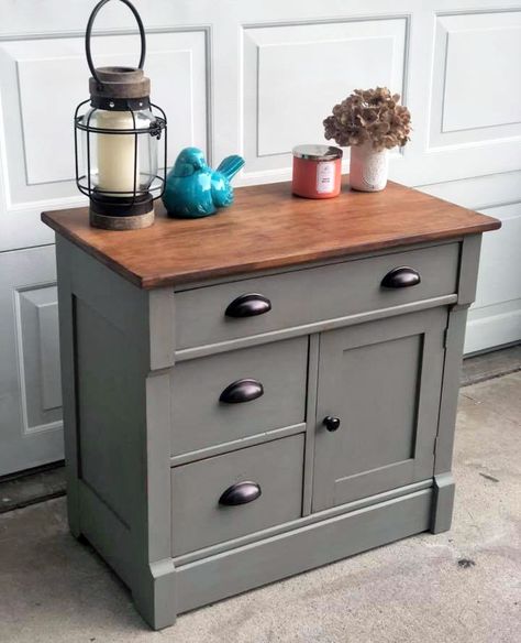 "This lovely antique commode was in phenomenal shape and just needed to be cleaned and refreshed. The top was sanded and stained in General Finishes Antique Walnut (Gel Stain) while the body was painted in General Finishes Perfect Gray. I then distressed the piece some and added dark wax for contrast and protection. I also gave it new antique bronze hardware." General Finishes Antique Walnut, Walnut Gel Stain, Antique Commode, Sideboard Makeover, China Hutch Decor, Grey Painted Furniture, Gray Painted Furniture, Hutch Decor, General Finishes