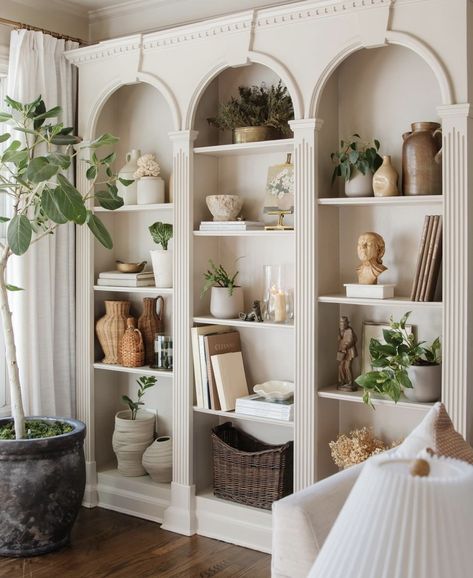 Curved Shelves Built Ins, Bookcase And Plants, Built In Shelves With Arch, Arch Shelves Built Ins, Arched Shelf Decor, Arched Book Shelf, Arched Shelf Built In, Arched Tv Wall, Arched Bookshelf Built Ins