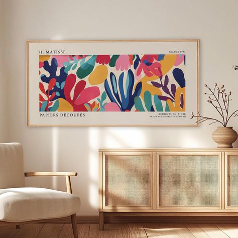 Immerse your space in the vibrant world of Henri Matisse with this stunning cut-outs exhibition poster. Celebrating the masterful use of color and form, this poster showcases Matisse's iconic paper cut-outs, capturing the essence of modern art. Perfect for adding a splash of creativity and energy to any room, this piece is a must-have for art enthusiasts and those looking to bring a touch of artistic brilliance to their home decor. ⭐️QUALITY⭐️ ★ High Quality and Eco Friendly Canvas Print. ★ Digi Matisse Cut Outs, Flower Market Print, Panoramic Wall Art, Matisse Print, Print Flower, Large Poster, Wall Art Modern, Paper Cutout, Exhibition Poster