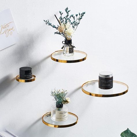 Floating gold ring glass shelves that will make your home look like a high-end showroom. Be prepared for guests to ask "how much?" for your design services. Circle Wall Shelf, Wall Art Ideas Diy, Mirror Area, Float Shelf, Floating Glass Shelves, Simple Home Decoration, Modern Wall Shelf, Home Decor Shelves, Garden Home Decor