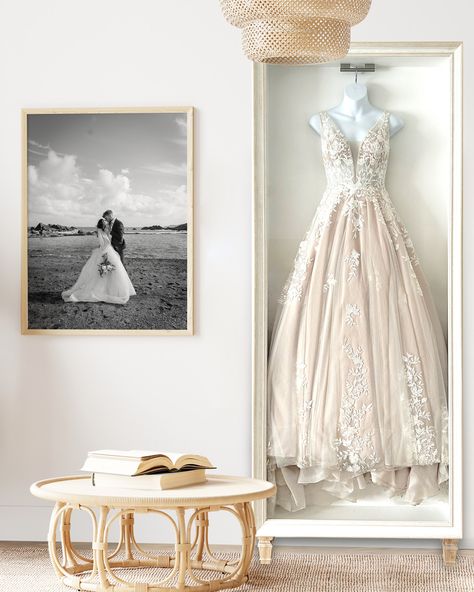 White full size wedding dress frame preserving a wedding gown styled in a bedroom next to a smaller frame showing the wedding day Bride Bedroom Design, Framed Wedding Dress In Closet, Wedding Dress Save Ideas, Display Wedding Dress At Home, Preserved Wedding Dress, Wedding Dress Framing, Wedding Dress Framed, Wedding Dress Frame Display, Wedding Dress Display In Closet