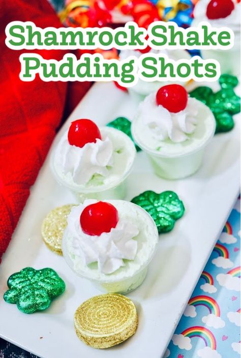 Shamrock Shake Pudding Shots Shamrock Shake Pudding Shots, Green Pudding Shots, Mint Pudding Shots, Pudding Shots With Baileys, Shots With Baileys, Boozy Shamrock Shake, Green Pudding, Mint Pudding, Rainbow Jello Shots