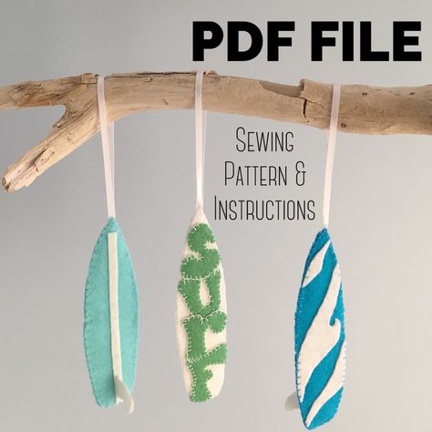 Hey folks - learn to make your own surfboard ornaments - awesome to give as gifts for Valentine's Day, birthdays, baby showers - any occasion for a beach or surf lovin' friend! Surfboard Ornaments, Diy Surfboard, Tropical Christmas Decorations, Felt Dog Ornament, Hawaiian Crafts, Surfboard Decor, Yule Gift, Coastal Christmas Decor, Hawaiian Christmas