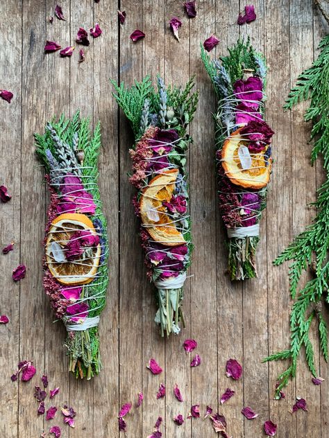 Set positive intentions And ground into sacred space this New Year with the love of plants 💚 This burn bundle features healing coming together of Cedar Lavender Amaranth  Rose Citrus  Quartz crystal wrapped kindly into every wand to amplify the healing energy🌠 Cedar is so fun to burn- it crackles and adds a certain sacred sound healing to experience✨ Each wand unique & oh so magical️ Display as decorative altar piece until ready to use/burn 🔥🌟 Approximately 8" Smudge Sticks Diy, Yuletide Decorations, Witchy Altar, Sage Wands, Herbal Store, Teen Witch, Sage Smudging, Healing Wands, Smudge Sticks