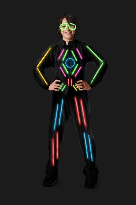 A LightSuit is part dress-up, part Halloween, part party and part craft. The solid black jumpsuit comes in 6 sizes. The wearer can design his/her own costume using the variety of glowsticks that come with the jumpsuit. An accessory package that includes 50 glowsticks, 20 connectors and glow glasses can be purchased. Made with fine-spun polypropylene (the material disposable hospital gowns are made of), trim them with scissors - without fraying - to better fit the child. lightsuits.com Stick Figure Halloween Costume, Glowstick Costume, Stick Figure Costume, Glow Outfits, Dark Costumes, Glow In Dark Party, Glow Stick Party, Glow In The Dark Halloween, Light Suit