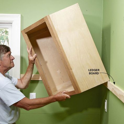 Tips for installing box cabinets successfully. Learn how to hang kitchen wall cabinets and install island cabinets with these pro tips. Install Cabinets, Estate Kitchen, Pallet Cabinets, Installing Kitchen Cabinets, House Storage, Basement Finishing, Diy Dresser Makeover, Kitchen Wall Cabinets, Diy Accent Wall