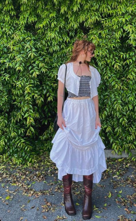 Caroline tucker, fashion, style, lifestyle, inspiration, tumblr, aesthetic, white, skirt, gingham, americana, gothic, coquette, boots, vintage, rose, choker, glasses, 1990s, tiered, feminine, black, cottagecore White Prairie Skirt Outfit, Gothic Americana Fashion, Windy Weather Outfit, Prairie Skirt Outfit, Peasant Skirt Outfit, Caroline Tucker, White Tiered Skirt Outfit, Vintage Americana Outfits, Coquette Boots