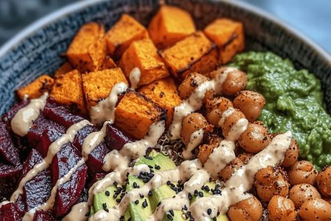 Enjoy this Roasted Beet and Sweet Potato Buddha Bowl with tahini dressing! A nutritious, colorful, and flavorful plant-based meal. Sweet Potato Pesto Buddha Bowl, Roasted Beet And Sweet Potato Budda Bowl, Vegan Buddha Bowl Recipes, Quinoa Sweet Potato, Light Soups, Healthy Bowls Recipes, Beet Recipes, Buddha Bowl, Roasted Beets