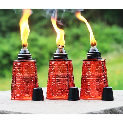 PRICES MAY VARY. Seraphic tabletop torches will provide a decorative accent to your backyard or patio party. 16oz glass table top torches, set of 3 torches, set of 3 wicks and snuffers included Each torch measures 7" tall by 3.5" diameter Clean burning citronella torch oil recommended (not included). 6 hour burn time per fill up. Store product away from the weather conditions when not in use. Store upright in a dry location. Seraphic tabletop torches provide decorative accent to your backyard or Torches Tiki, Citronella Torches, Oil Lamp Candle, Citronella Oil, Patio Party, Tiki Torches, Citronella Candles, Outdoor Backyard, Deck Garden