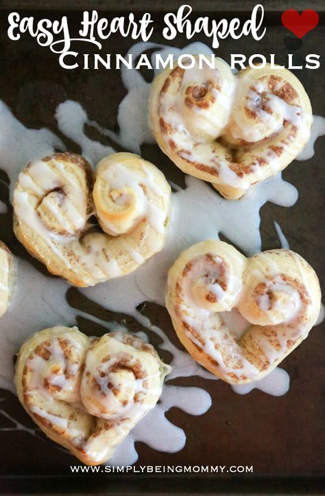 These Easy Heart Shaped Cinnamon Rolls are super cute, easy to make, and perfect for a Valentine's Day breakfast. Did I mention they're super easy? #valentinesday #valentinescinnamonrolls Valentines Drinks, Shaped Cinnamon Rolls, Heart Shaped Cinnamon Rolls, Breakfast Cakes, Valentine Recipes, Easy Valentines, Rustic Valentine, Friendship Party, Valentine's Ideas