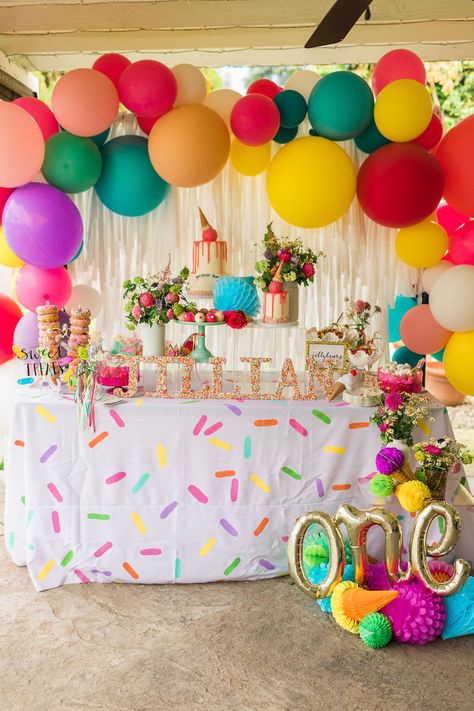 I'm swooning over the sweetness in this Sprinkles and Ice Cream Birthday Party by Juliet Boydstun of the COOP - LA, out of California! Dripping with details delicious and darling, this first birthday celebration is packed with ideas you have to get a scoop of! So lick your lips and take a bite out of these adorable elements that are beyond amazing:  Acrylic Party Signage Melting Ice Cream Cone Party Hats Sprinkle Linens Colorful Dessert Table Balloon Garland  Ice Cream Themed Partyware Sprinkle 23 Bday, Sprinkles Birthday Party, 21st Ideas, Cream Birthday Party, Colorful Birthday Party, Colorful Desserts, Sprinkle Party, Ice Cream Birthday Party, Candyland Party