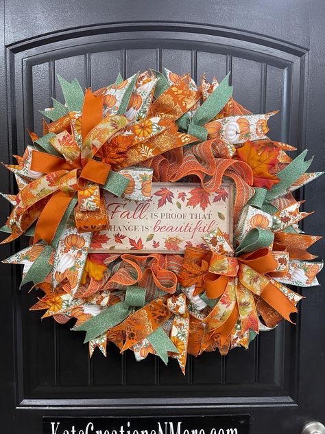 Welcome the cozy, colorful season with this stunning handmade Fall wreath, perfect for adding a touch of autumnal charm to your home! This beautiful wreath is crafted on a jute burlap mesh base, featuring a soothing palette of sage, cream, and orange--perfectly capturing the essence of fall. The centerpiece of this wreath is a heartwarming sign that reads, "Fall is proof that change is beautiful," reminding us to embrace the beauty of transformation that this season brings. Surrounding the sign are lush, realistic fall leaves that bring a burst of autumn color and texture, making this wreath a true statement piece for your door, wall, or mantel. Adding to its charm are luxurious double 6-ribbon bows, carefully crafted to complement the wreath's color scheme. The ribbons add a touch of eleg Thanksgiving Mesh Wreath, Fall Leaf Wreaths, Fall Accents, Fall Swags, Deco Mesh Wreaths Diy, Wreath Hanger, Mesh Wreath Diy, Moms Crafts, Leaf Wreath