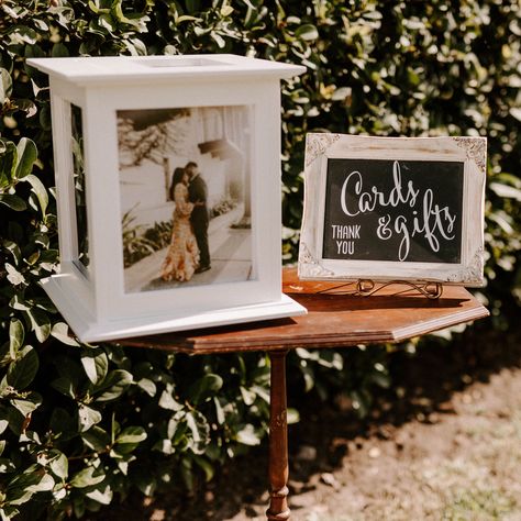 Your guests will more than likely come to the wedding bearing gifts, so it should go without question that a gift table definitely needs a place in your overall wedding day décor. With a beautiful presentation, you’ll not only create a striking moment, but you’ll leave very little room for guests to be left wondering: Where should I put this gift? Wedding Card Box Ideas Diy, Unique Wedding Card Box Ideas, Wedding Welcome Table, Wedding Gift Card Box, Diy Card Box, Gift Table Wedding, Money Box Wedding, Unique Wedding Cards, Gift Table Signs