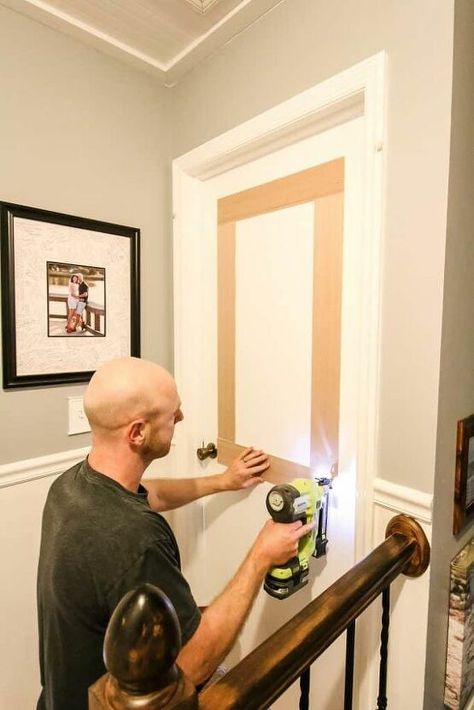 The boring, flat panel interior doors were really dating our home. However, I didn't want to spend the money to replace them all. So, we decided to use plywood to give them the effect of molding. Cut 1/4" plywood into strips. You'll have to do math to determine the size that you want the boxes to be on each door. Check your math 3 times because we sure did mess it up! Draw a diagram for best results, and then tape the design onto the door to be sure. There's more details on that proces… Update Interior Doors, Interior Doors Diy, Deur Makeover, Flat Panel Interior Doors, Interior Door Makeover, Diy Interior Doors, Pintu Interior, Stained Trim, Flat Panel Doors