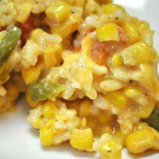 Sweet Corn and Rice Casserole - GOODEness Gracious Velveeta Rice, Corn And Rice Casserole, Corn And Rice, Canning Sweet Corn, Rice Casserole Recipes, Shredded Cheddar Cheese, Corn Casserole, Creamed Corn, Diced Tomatoes