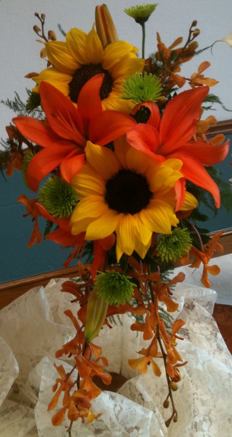 Sunflower And Lily Bouquet, Fall Wedding Bouquets Lilies, Orange Sunflower Bouquet, Tiger Lilies Bouquet, Orchid And Sunflower Bouquet, Sunflowers And Lilies, Lilly Bouquet Wedding, Orange Lily Bouquet, Stargazer Lily Wedding Bouquet