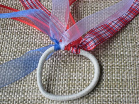 DIY ribbon hair bands:  Just tie ribbons onto an elastic rubber band and voila!  You can use any colors or ribbons that you like! Hair Ponies, Ribbon Hair Ties, Hair Ties Diy, Elastic Rubber Band, Hair Elastic, Hair Ribbons, Ice Breakers, How To Make Ribbon, Elastic Hair Ties