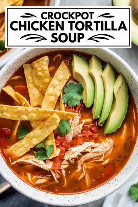 Crockpot chicken tortilla soup topped with avocado, tortilla strips, and cilantro in a white bowl. Crock Pot Chicken Tortilla Soup Recipes, Easy Crockpot Tortilla Soup, El Fenix Chicken Tortilla Soup, Low Fodmap Chicken Tortilla Soup, Tortilla Chicken Soup Crockpot, Weight Watchers Tortilla Soup, South West Chicken Soup, On The Border Chicken Tortilla Soup, Chicken Corn Tortilla Soup