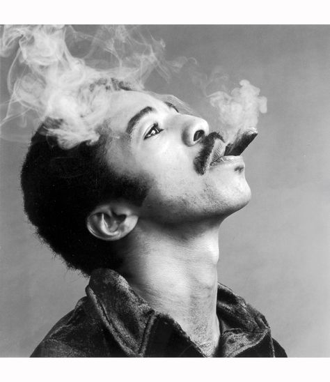 jazz drummer Tony Williams (1945-1997) holding his head back and smoking a cigar. 1969 © Jack Robinson Tony Williams Drummer, Jazz Drummer, Jack Robinson, Tony Williams