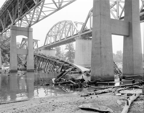 The Jefferson Davis Highway/Rt. 1 bridge over the Occoquan Creek was badly damaged in the aftermath of Hurricane Agnes. Located on the outskirts of Woodbridge on the border of Prince William and Fairfax Counties. 7/20/1972. No. 72-1479, Virginia Governor's Negative Collection, Library of Virginia. Fairfax County Virginia, Woodbridge Virginia, Virginia History, Jefferson Davis, Fairfax County, The Aftermath, George Washington Bridge, Wood Bridge, June 22