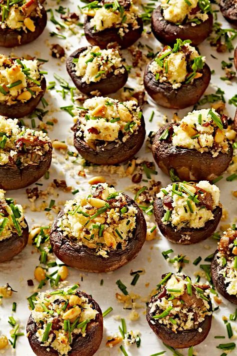 Herb- and Goat Cheese-Stuffed Mushrooms Goat Cheese Stuffed Mushrooms, Cheese Stuffed Mushrooms, Cheesy Appetizer, Stuffed Mushroom, Finger Foods Easy, Holiday Side Dishes, Cheese Stuffed, Thanksgiving Appetizers, Holiday Appetizers