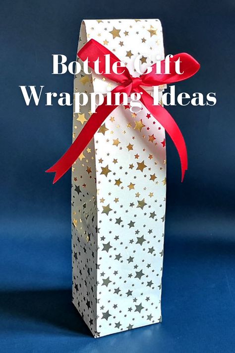 Gift wrapping ideas for tumbler. Wine Bottle Gift Box Diy, Wrap A Wine Bottle With Wrapping Paper, How To Make A Wine Bottle Gift Bag, How To Gift Wrap A Bottle Of Wine, Water Bottle Wrapping Ideas, Diy Wine Bottle Gift Bags, How To Gift Wrap A Perfume Bottle, Gift Wrapping Ideas Bottle, How To Pack Bottles Gift Ideas