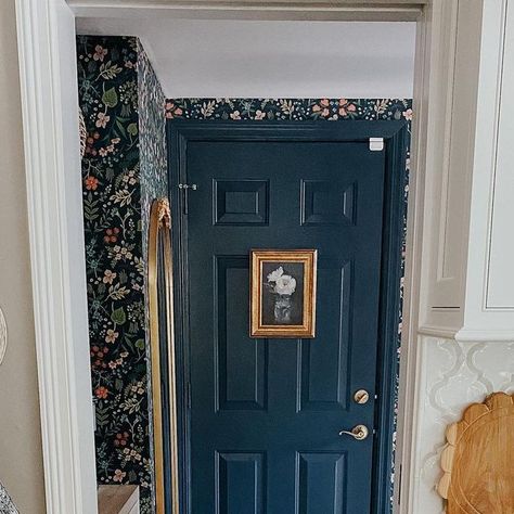 Stephanie Kane on Instagram: "Someone asked if I painted the other door in the mudroom…I sure did and here she is. I even hung some art on her! I got many references to the picture frame on Monica and Rachel’s door on friends! I’ll take it! Let’s start a new trend - art on doors!! #artondoors #painteddoor #paintedtrim #wallpapermudroom #riflepaperco #navypaint #bhghome #betterhomesandgardens #housebeautiful #sodomino #thecottagejournal" Hanging Art On Doors, Painting Pocket Doors, Wallpaper On Door, Art On Door, Painted Door Frames, Barn House Kitchen, Painted Bedroom Doors, Monica And Rachel, Dutch Farmhouse