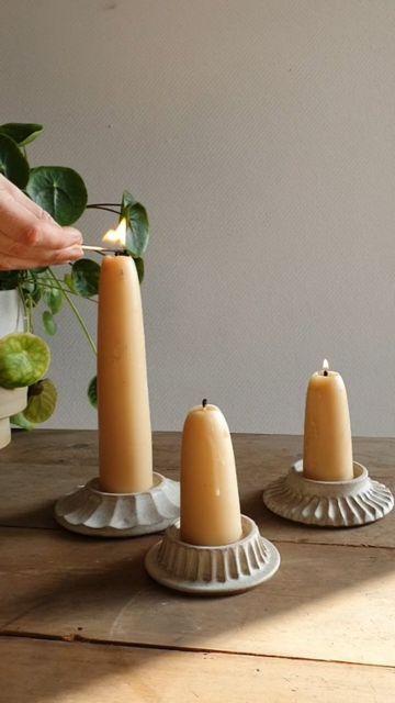 Hilda Carr Pottery on Instagram: "Lots of new things out of the kiln this morning including a few of these candle plates. They'll be available 👉🏻 THIS THURSDAY 17TH at 7pm 👈🏻 (hooray!) And there'll be the option to purchase them with or without a pair of these gorgeously chunky beeswax candles. - - #hyggehome #ceramics #myhomestyle #myhomevibe #myscandihome #pottery #handcarved #handmadeceramics #handmadepottery #wheelthrown #shopsmall #justacard #wearethemakers" Handmade Pottery Candle Holder, Hand Built Pottery Candle Holder, Candle Holder Ceramics, Pottery Without A Wheel, Candleholder Ceramic, Chunky Candle Holders, Diy Candle Stick Holder, Candle Holders Diy, Ceramic Candles