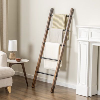 Introducing a versatile addition to your bathroom, this rustic burnt wood standing bathroom ladder towel rack features 5 metal rungs, perfect for drying delicates or displaying towels and blankets. Its solid burnt wood frame adds a charming rustic accent while offering stability and durability. With no installation required, this free-standing towel rack can be easily moved from room to room, complementing rustic, vintage, industrial, or contemporary decor. Providing ample storage and display sp Towel Ladder Bathroom, Ladder Towel Racks, Long Bathroom Rugs, Long Bathroom, Wood Towel Rack, Standing Towel Rack, Bathroom Ladder, Free Standing Towel Rack, Bathroom Towel Rack