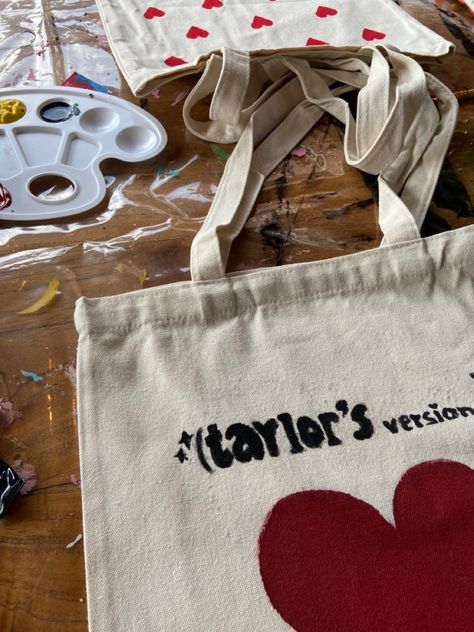 tote bag, summer, taylor swift, heart aesthetic, taylors version, coquette, dollette aesthetic, painting tote bags, painting ideas, painting tote bags aesthetic, painting tote bags ideas, painting totes ~ #tote #totebagpattern #totebagdesign #taylorswift #taylor #heart #hearts #coquette #dollette #painting #paint Bags Painting Ideas, Painting Tote Bags Aesthetic, Tote Bags Painting Ideas, Tote Bags Painting, Taylor Swift Heart, Tote Bag Painting, Handpainted Tote, Diy Tote Bag Design, Handpainted Tote Bags