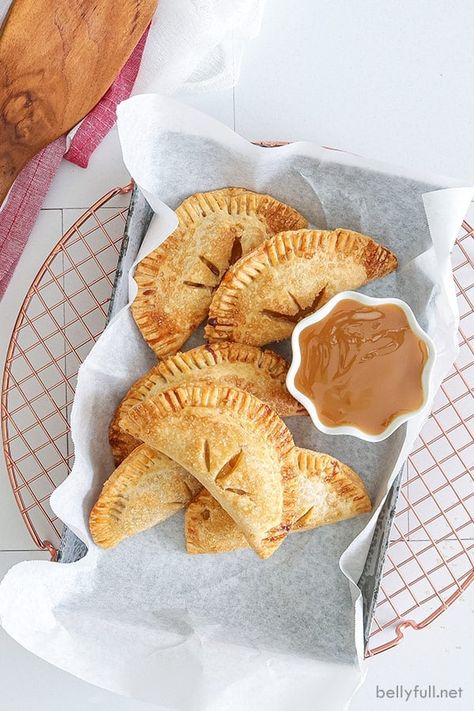 These Air Fryer Apple Hand Pies are portable and delicious! With an easy apple pie filling and flaky crust, they’re such a fun Fall dessert with no slicing and little mess. For an added treat, dunk them in homemade caramel sauce! Blueberry Trifle Recipe, Easy Apple Pie Filling, Fun Fall Desserts, Air Fryer Recipes Dessert, Fried Apple Pies, Homemade Apple Pie Filling, Homemade Pie Crust Recipe, Canned Apple Pie Filling, Hand Pie Recipes