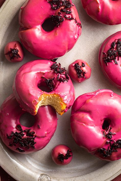 Yeast Doughnuts with Hibiscus Glaze Hibiscus Bread, Hibiscus Dessert, Hibiscus Glaze, Hibiscus Recipes, Hibiscus Recipe, Yeast Doughnuts, Sweet Potato Pound Cake, Flower Recipes, Work Recipes