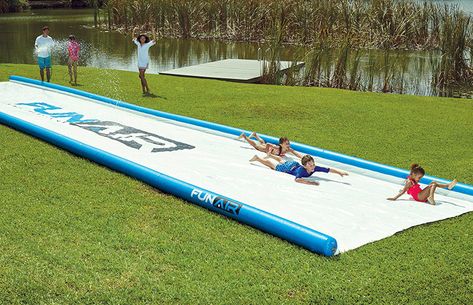 Take slipping and sliding across the lawn to the next level this summer with this monstrous 10 foot wide by 50 foot long backyard water slide with inflatable side bumpers. Giant Slip And Slide, Field Day Games, Slip N Slide, Leisure Pools, Beach Necessities, Big Backyard, Slip And Slide, Kids Discover, Water Slide