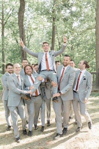 Grey Suit With Copper Tie, Grey And Rust Wedding Party, Cinnamon And Grey Wedding, Grooms Tux Fall Wedding, Light Grey Suit Fall Wedding, Fall Wedding With Grey Suits, Earth Tone Groomsmen Attire, Grey Suit With Rust Tie, Fall Wedding Grey Suits