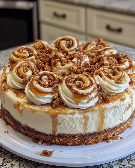 Cinnamon Roll Honeybun Cheesecake Ingredients: For the Crust 2 cups graham cracker crumbs 1/2 cup unsalted butter, melted 1/4 cup granulated sugar 1 teaspoon ground cinnamon For the Cheesecake Filling 3 packages (8 oz each) cream cheese, softened 1 cup granulated sugar 1/2 cup sour cream 2 teaspoons vanilla extract 3 large eggs For the Cinnamon Swirl 1/3 cup brown sugar 2 teaspoons ground cinnamon 2 tablespoons unsalted butter, melted For the Glaze 1 cup powdered sugar 2... Cinnamon Rolls Honeybun Cheesecake, Honeybun Cheesecake, Caramel Brownies Recipe, Roll Cheesecake, Cheesecake Ingredients, Cinnamon Cheesecake, Cinnamon Roll Cheesecake, Cheesecake Filling, Cheesecake Desserts