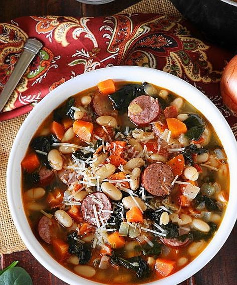 Loaded with garlic, onion, carrots, kielbasa, white beans, & fresh baby spinach, White Bean & Kielbasa Soup with Spinach is also loaded with flavor. Spinach White Bean, Kielbasa Soup, Soup With Spinach, Kielbasa Recipes, Soups Stews Chilis, Spinach Soup, Delicious Soup Recipes, Soup And Stew, Healthy Comfort Food