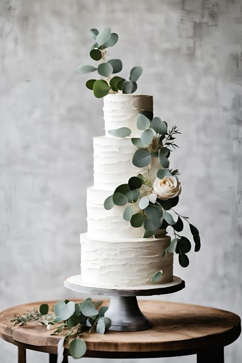 Romantic white wedding cake with eucalyptus. Perfect for and white and greenery wedding theme.     #romanticwedding #romanticwhitewedding #romanticweddingcake #weddingcake #weddingcakedecorations #weddingcakeideas #weddingcakeinspiration #whiteweddingcake #whiteweddingcakewithgreenery #whiteweddingcakewitheucalyptus #eucalyptusweddingtabledecor #eucalyptusweddingcake #greeneryweddingcake #whiteandgreenerywedding #whiteandgreeneryweddingideas Wedding Cake With Eucalyptus, Cake With Eucalyptus, Eucalyptus Wedding Cake, White And Greenery Wedding, Greenery Wedding Theme, 4 Tier Wedding Cake, Spring Wedding Cake, Floral Wedding Cake, Romantic Wedding Cake