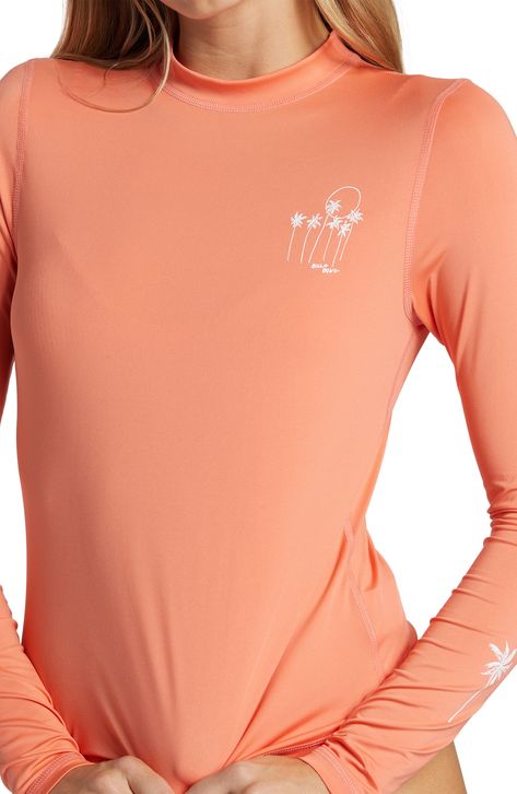 A relaxed fit makes it easy to get into this long-sleeve rashguard designed to protect you from the sun's rays. 23" length (size Medium) Crewneck Long sleeves UPF 50+ sun protection 87% polyester, 13% elastane Machine wash, tumble dry Imported Upf Clothing, Gift Guide Women, Surf Tee, Long Sleeve Rashguard, Surf Shirt, Rash Guard, Papaya, Billabong, Upf 50