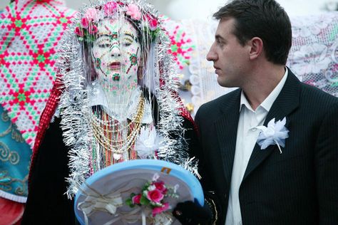 A Bulgarian bride from the Pomak minority (ethnic Bulgarian speaking Muslims), is seen during the traditional, centuries old preparation for her two-day wedding ceremony in the village of Ribnovo some 210km from the capital Sofia on 24 January, 2010. The mountain village is famous for performing the unique wedding ceremonies in winter time only Visual Anthropology, Bulgarian Wedding, Slavic Design, Bride Looks, Bright Wedding Colors, Mexican Wedding Dress, Chinese Wedding Dress, Japanese Wedding, White Wedding Gowns