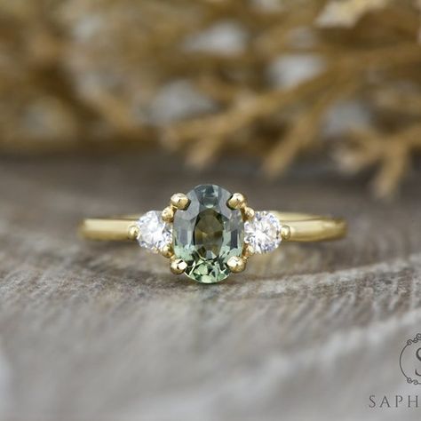 Green sapphire engagement ring