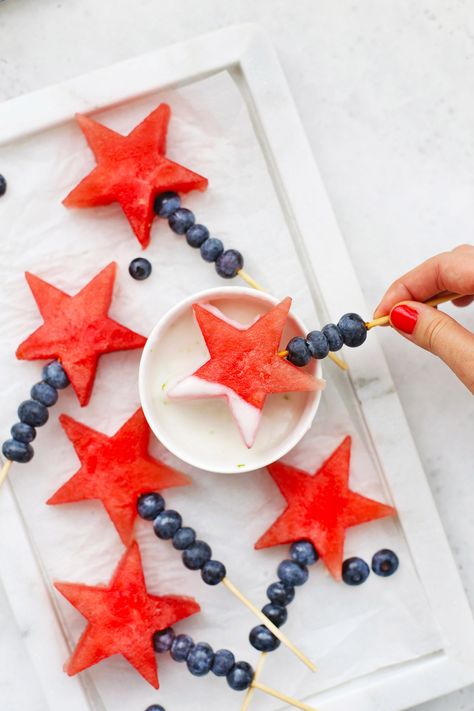 Watermelon Star Sparklers - Watermelon stars and blueberries combine to make these fun, patriotic fruit sparklers. They're a perfect, easy snack or summer side dish. (Naturally Paleo, Vegan & Gluten-Free) // Patriotic Fruit Skewers // 4th of July Side Dish // Red White and Blue Recipes #snack #4thofjuly #summerrecipe #sidedish #fruit #healthysnack Fruit Sparklers, Watermelon Stars, Blue Recipes, Summer Side Dish, Fruit Skewers, Yogurt Dip, Summer Side Dishes, Paleo Vegan, 4th Of July Party