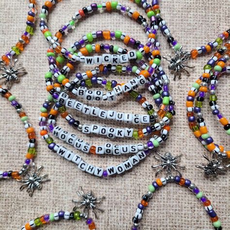 🎃👻 Get into the spooky spirit this October with our Halloween accessories from Doohickies & Such! Our word bracelets, featuring a fun Halloween theme, are perfect for adding a festive touch to your outfit. Plus, our seed bead spider bracelets in classic Halloween colors are a must-have for a stylish yet spooky stack. Mix and match to create your perfect Halloween look! 👽🖤 Shop now in our Etsy store to elevate your October fashion! 🍂✨ #HalloweenStyle #DoohickiesAndSuch #EtsyShop #HalloweenAcc... Halloween Word Bracelet, Seed Bead Spider, Words For Bracelets, Bead Spider, Word Bracelets, Halloween Colors, October Fashion, Beaded Spiders, Halloween Words