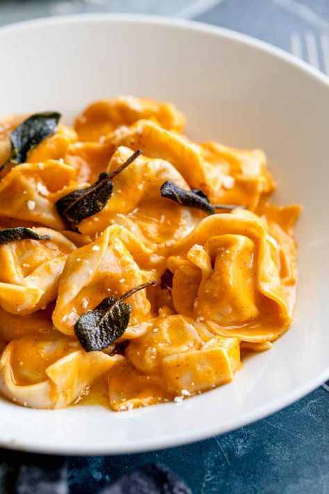 Tortellini with Pumpkin Sauce is a simple and quick recipe for a lovely autumn dinner. The sauce is made with pumpkin, sage, brown butter, and Parmesan. Kids and adults will love this dish and you can serve it as a main dish for lunch or dinner, or for entree. #jernejkitchen #dinnerrecipes #vegetarian #lunchrecipes #pumpkinsauce #tortellini Butternut Tortellini, Autumn Appetizers, How To Make Tortellini, Sage Brown Butter, Autumn Dinner, Butternut Squash Puree, Appetizers For Kids, Tortellini Recipes, Pumpkin Sauce