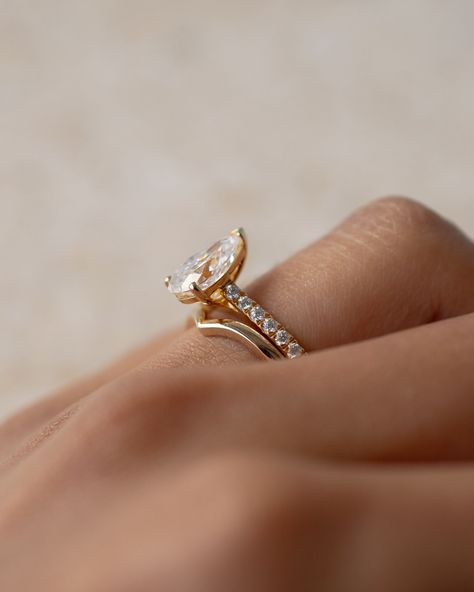 A matching pear engagement ring with plain curved wedding band Pear Ring With Wedding Band, Pear Engagement Ring With Wedding Band, Ring With Wedding Band, Pear Ring, Custom Engagement Rings, Classic Engagement, Instagram Wedding, Pear Engagement Ring, 2024 Wedding