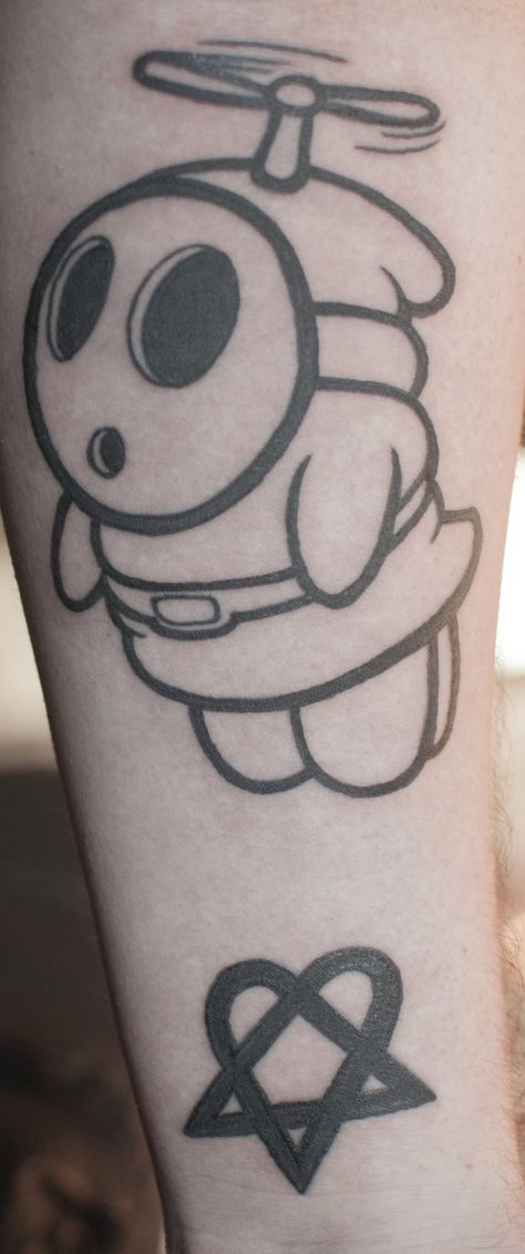 shy guy tattoo by v3xx3r.deviantart.com on @DeviantArt Paper Mario Tattoo, Shy Guy Drawing, Shy Guy Tattoo, Shy Guy Mario, Sleeve Background, Appearance Goals, Nintendo Tattoo, Mario Tattoo, Culture Tattoos