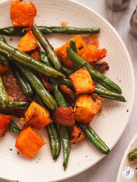 Made with sweet potatoes, green beans, and bacon, this Roasted Sweet Potato Supper is a quick and easy sheet pan dinner. Green Bean Sweet Potato Recipes, Sweet Potato And Green Beans, Sweet Potatoes And Green Beans, Pan Green Beans, Green Beans And Bacon, Beans And Bacon, Easy Sheet Pan Dinner, Potatoes Green Beans, Easy Sheet Pan Dinners